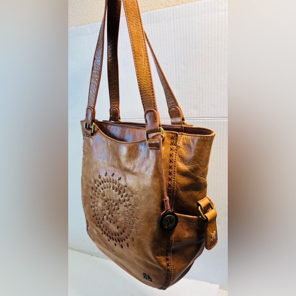 Vintage Sal Leather Shoulder bag featuring a bohemian style hand stitched sun